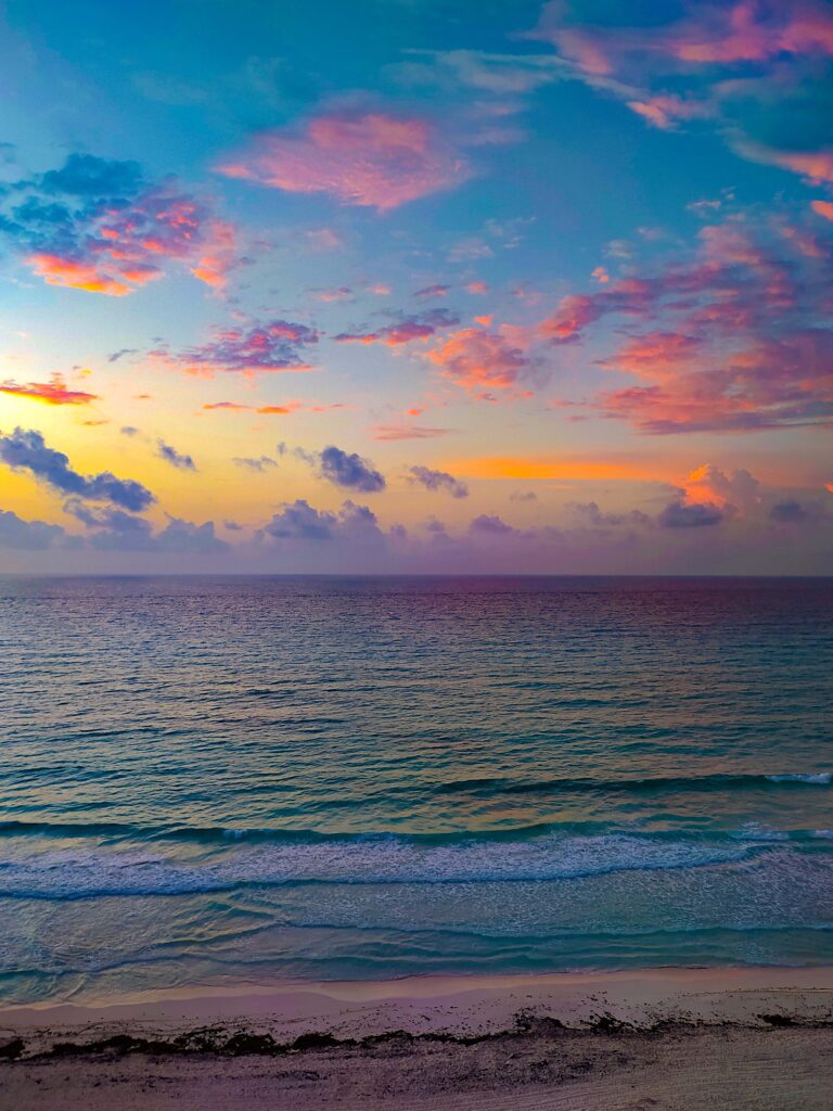 image of sunset over the ocean in the Riviera Maya Mexico 